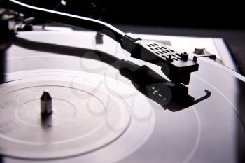 Royalty Free Photo of a Vinyl Record on a Turntable