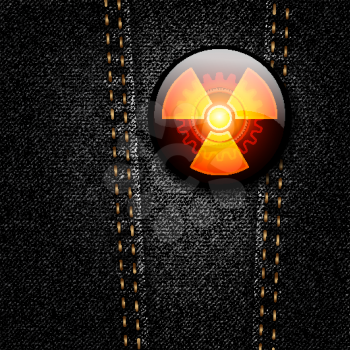 Radioactivity badge on black denim texture vector