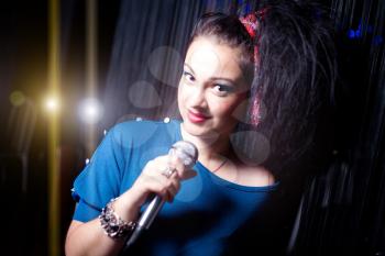 Portrait of a woman singing nightclub