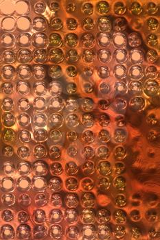 sparkles on a golden metal abstract background