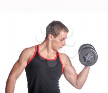 attractive athletic male torso with dumbbell sitting