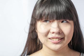 portrait of a lovely young asian woman studio on white headshot