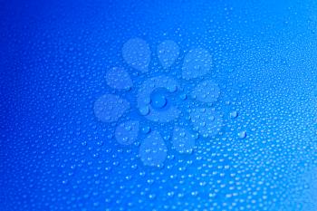 Drops on he wall of the bathroom. Water drops on blue background
