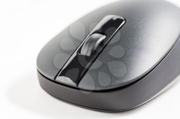 Closeup view of computer mouse on white background