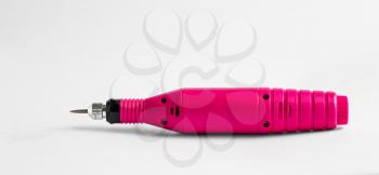 Hand drill of pink color on white