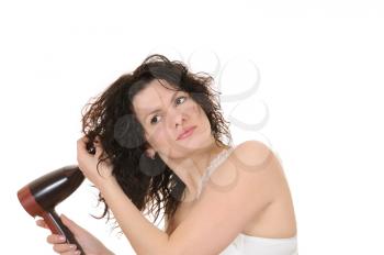 Royalty Free Photo of a Woman Using a Hairdryer 