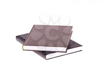 two brown books isolated on white background