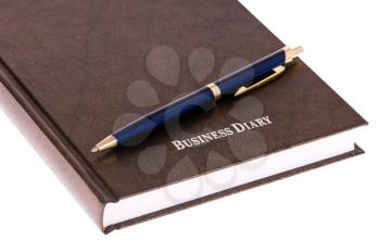 Royalty Free Photo of a Pen on a Business Diary