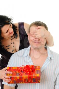 Royalty Free Photo of a Woman Giving a Man a Present