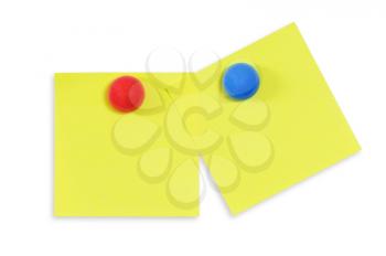 Yellow reminder notes with red pin isolated on the white background. 