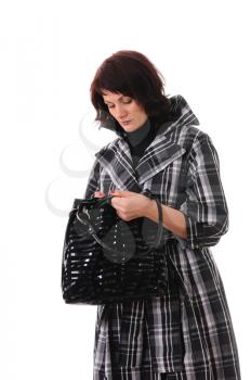 Royalty Free Photo of a Woman Looking Through Her Purse