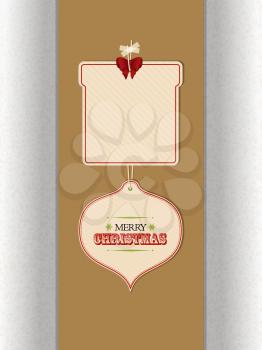 Two Christmas Gift Tags in Cardboard with Merry Christmas Text and Copy Space Hanging with Sellotape Over Brown Panel with Shadows