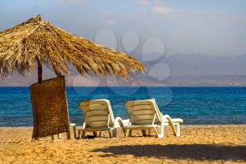 Royalty Free Photo of a Lounge Chair on the Red Sea