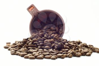 Cup with coffee beans on white
