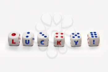 Royalty Free Photo of Dices Spelling Lucky