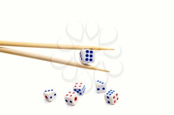 Royalty Free Photo of Chopsticks and Dice