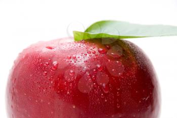 Royalty Free Photo of an Apple With Water on It