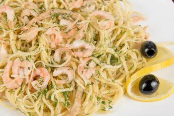 Royalty Free Photo of Pasta With Shrimp and Lemons 