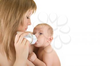 Royalty Free Photo of a Mother Feeding Her Baby