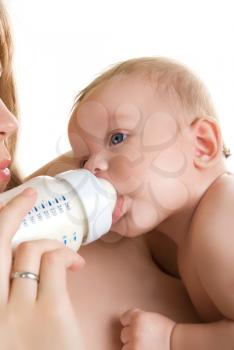 Royalty Free Photo of a Mother Feeding Her Baby