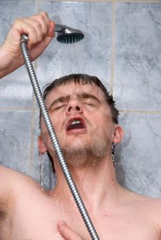 Royalty Free Photo of a Man Taking a Shower
