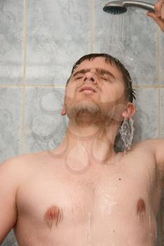 Royalty Free Photo of a Man Showering