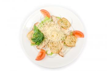 Tasty Salad dish with dried crust, vegetables, greens and cheese on a white background