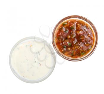 White and red sauces isolated on a white background