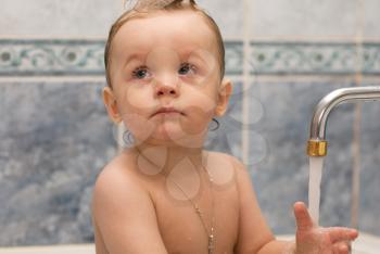 Royalty Free Photo of a Baby in a Bathtub 
