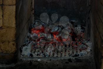 Royalty Free Photo of Live Coals in a Stove
