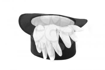 Black magic hat and white gloves isolated on a white background