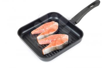 Royalty Free Photo of Trout Steak on a Grill Pan