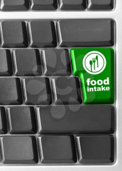 Royalty Free Photo of a  Computer Keyboard With Food instant Key