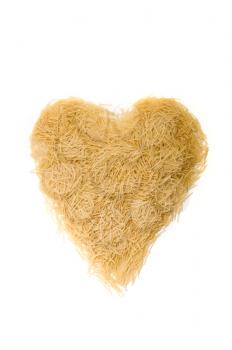 Noodles as heart on white background 