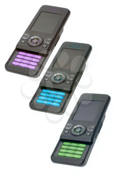 Three different color cell phones on white background