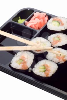 Royalty Free Photo of Rolls of Sushi and Chopsticks