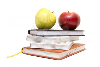 Back to school concept with books and apples on white