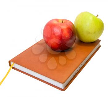 book and apples isolated on white background