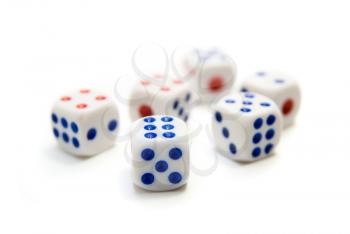 close up of blue and red dice on white background 
