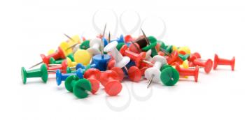 Different color push pins isolate on white background