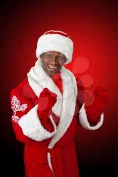 surprised black santa claus on a red background