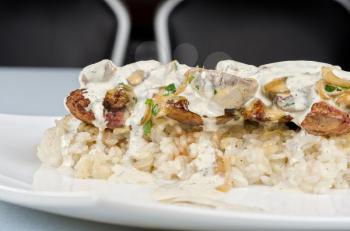 risotto with chicken liver, champignons and sauce
