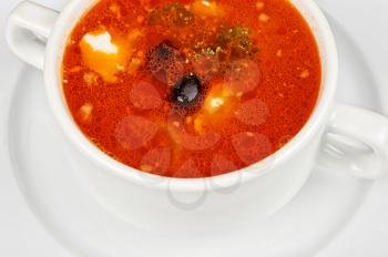 Closeup of solyanka soup at plate
