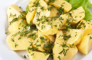fresh boiled potatoes with greens