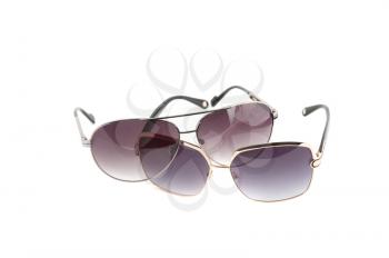 Group of sunglasses on white background