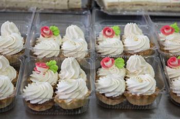 Ready mini cakes on factory