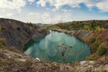 Blue lake in Altai. This is a former copper mine that was flooded with water