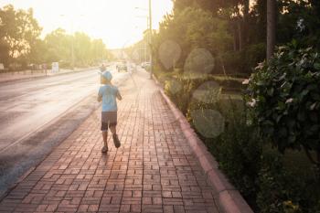 Kid boy walking at Alania city, Turkey