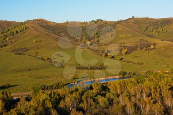 Beauty evening in the mountains in Altay, panoramic picture