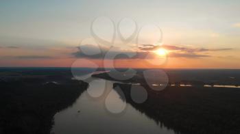 Aerial view of big siberian Ob river in beauty summer sunset, 4K drone footage.